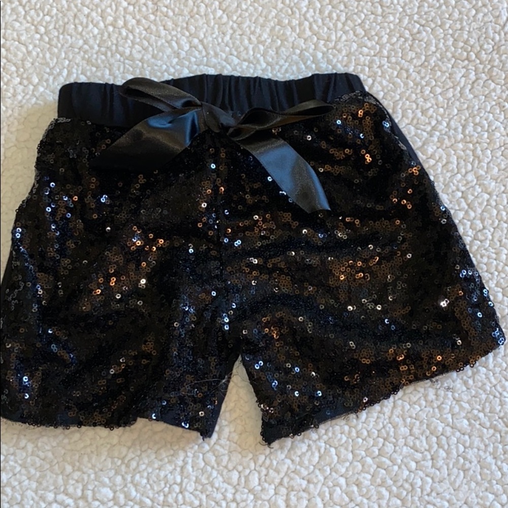 Sequence shorts with bow detail